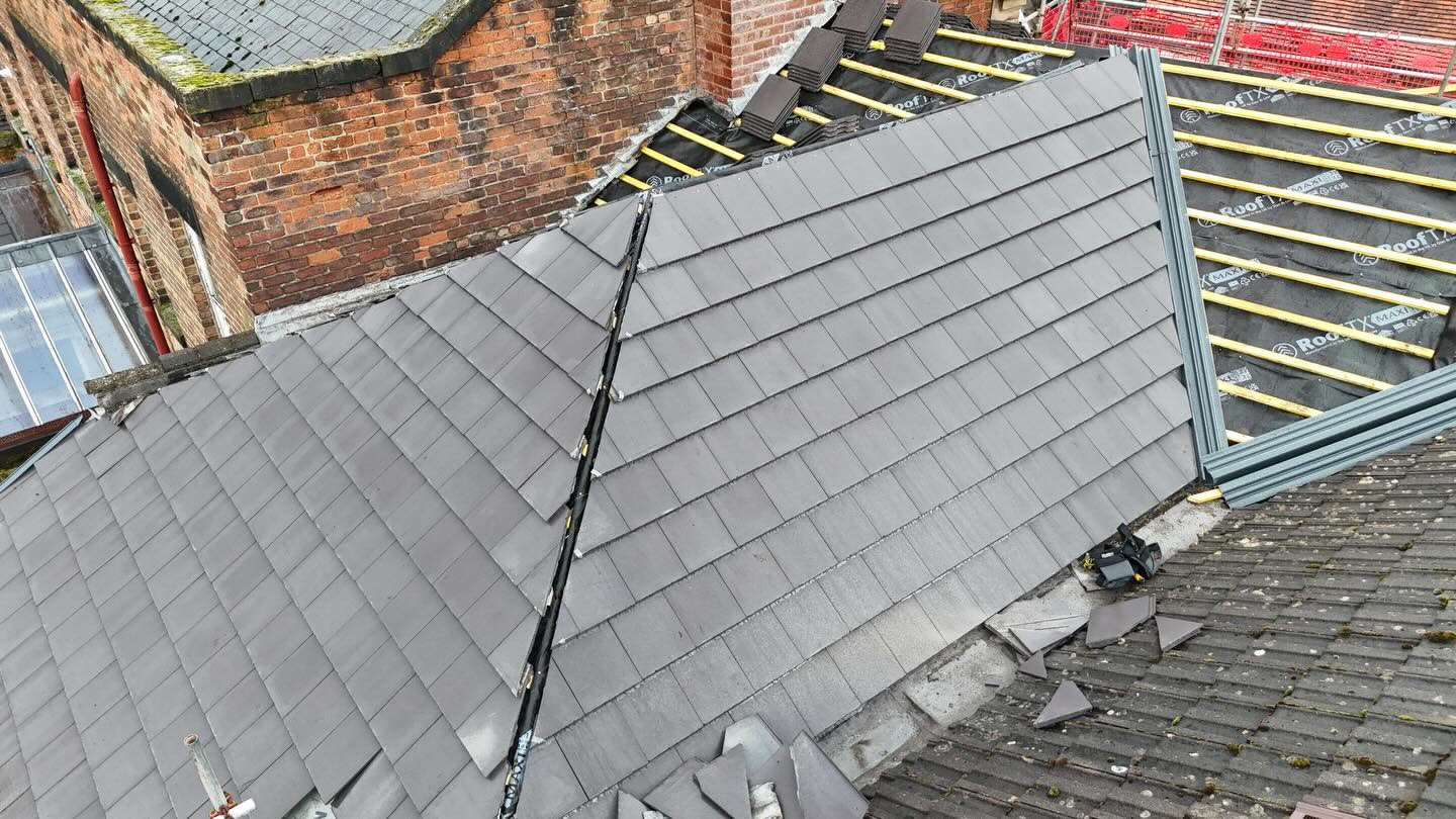 New grey slate roof with valley detail